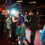Stylists from Antonino Salon in Birmingham demonstrate innovative styling techniques on stage.
