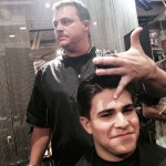 Randy Dingus Jr. demonstrates barbering techniques