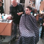 Randy Dingus demonstrates barbering techniques